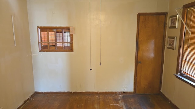 unfurnished room featuring wood finished floors