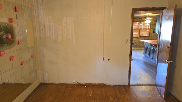 hall featuring wood finished floors