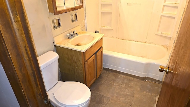 bathroom with toilet and vanity