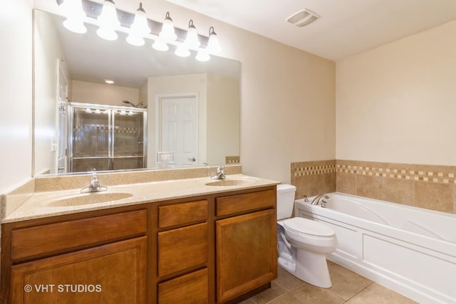 19 Tall Grass Ct, Streamwood, IL 60107 - full bathroom featuring tile patterned floors, a stall shower, toilet, a bath, and double vanity