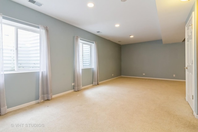 19 Tall Grass Ct, Streamwood, IL 60107 - spare room with light colored carpet, recessed lighting, and baseboards