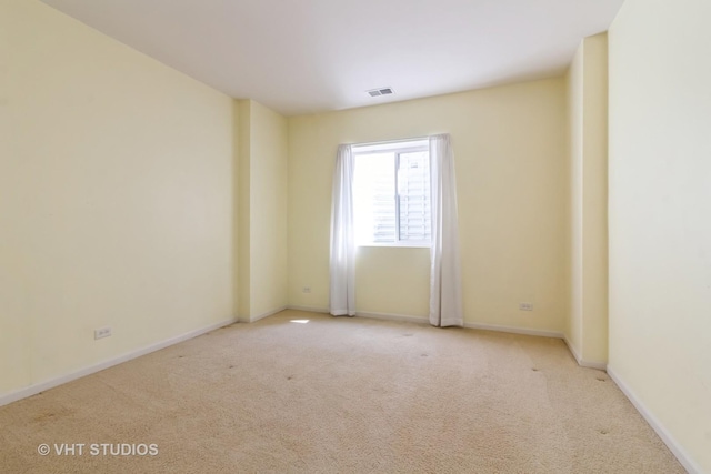 19 Tall Grass Ct, Streamwood, IL 60107 - carpeted spare room with baseboards