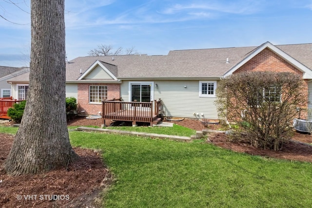 19 Tall Grass Ct, Streamwood, IL 60107 - rear view of house featuring a deck, a yard, and a shingled roof