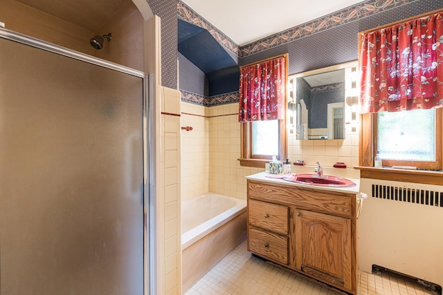 1753 N Normandy Ave, Chicago, IL 60707 - bathroom with radiator, a shower with door, vanity, a tub, and wallpapered walls