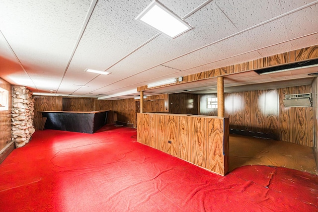 1753 N Normandy Ave, Chicago, IL 60707 - basement with wood walls, a bar, carpet, and a wall mounted AC