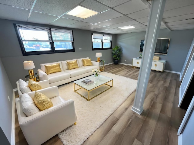 20084 Brook Ave, Lynwood, IL 60411 - living area featuring wood finished floors, baseboards, and a paneled ceiling