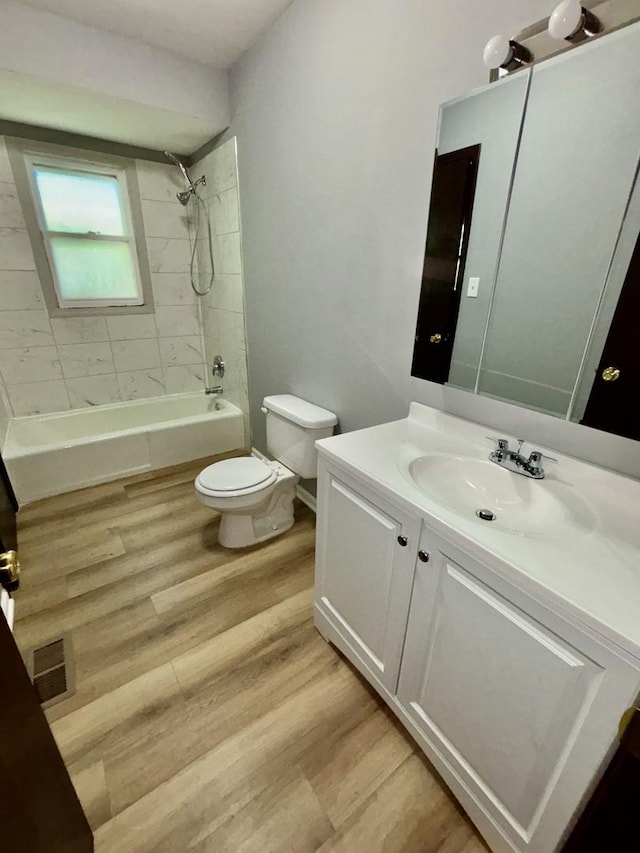 20084 Brook Ave, Lynwood, IL 60411 - bathroom featuring toilet, tub / shower combination, vanity, and wood finished floors