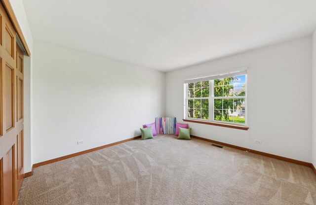 2739 Moraine Valley Rd, Wauconda, IL 60084 - carpeted spare room featuring baseboards