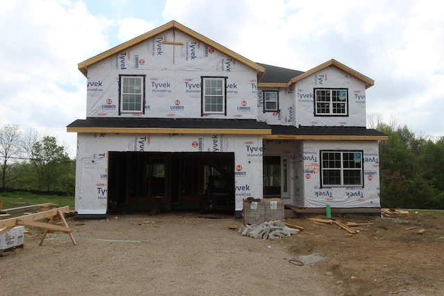 property in mid-construction featuring a garage