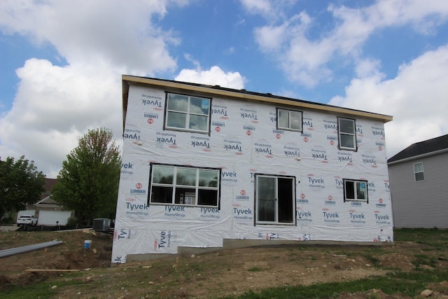 view of front of home with central AC unit
