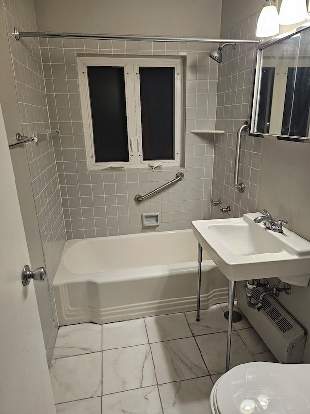 606 Green Bay Rd Unit 2A, Glencoe, IL 60022 - full bathroom featuring marble look tiles and shower / bath combination