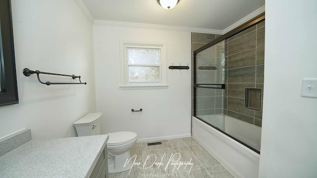 full bath with vanity, crown molding, combined bath / shower with glass door, baseboards, and toilet