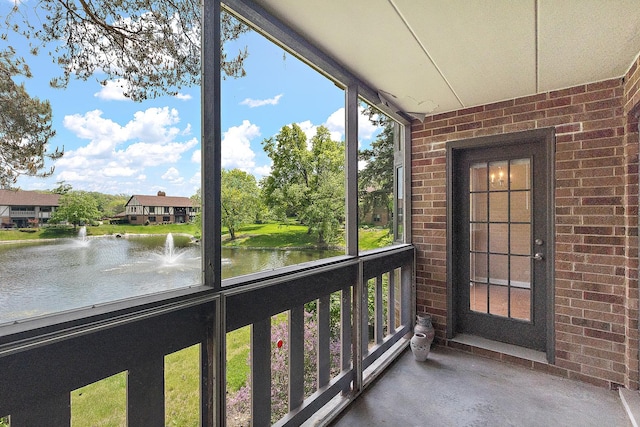 13151 S Westview Dr Unit 1B, Palos Heights, IL 60463 - unfurnished sunroom featuring a water view
