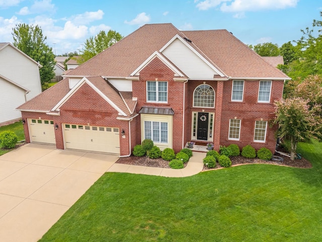 6 Conway Cir, Bloomington, IL 61704 - view of front facade with an attached garage, a front yard, brick siding, and concrete driveway