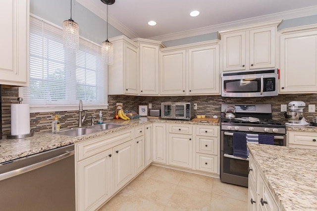 6 Conway Cir, Bloomington, IL 61704 - kitchen with stainless steel appliances, a sink, light tile patterned floors, ornamental molding, and backsplash