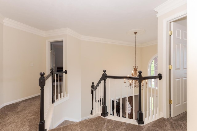 6 Conway Cir, Bloomington, IL 61704 - hall with carpet flooring, an upstairs landing, a chandelier, ornamental molding, and baseboards