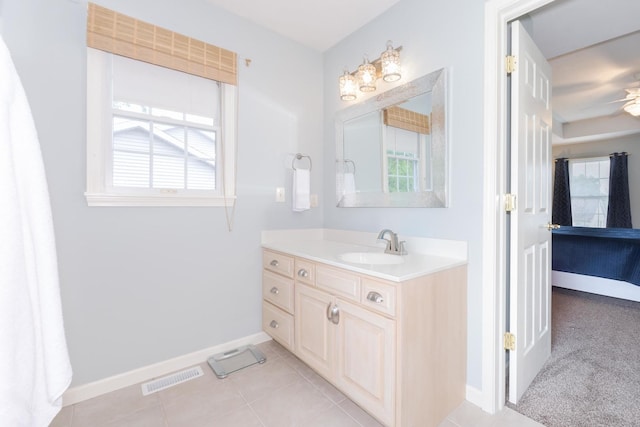 6 Conway Cir, Bloomington, IL 61704 - bathroom featuring baseboards, tile patterned floors, vanity, ensuite bath, and a ceiling fan