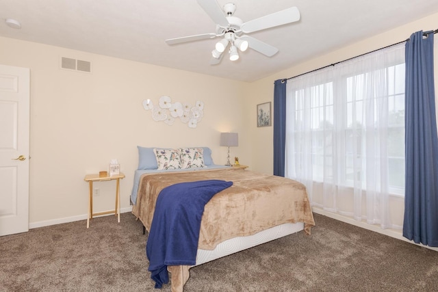 6 Conway Cir, Bloomington, IL 61704 - bedroom with carpet, ceiling fan, and baseboards