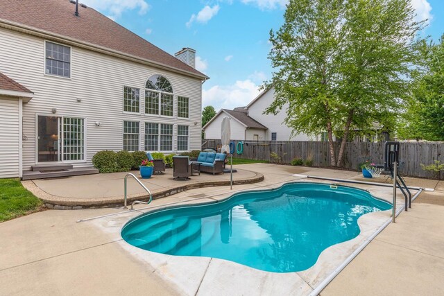 6 Conway Cir, Bloomington, IL 61704 - view of swimming pool featuring a patio area and a fenced backyard