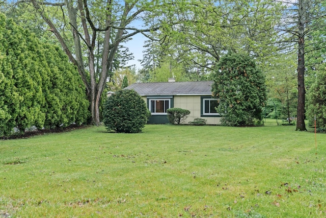 5 Stonegate Cir, Lincolnshire, IL 60069 - view of front of home with a front lawn and a chimney