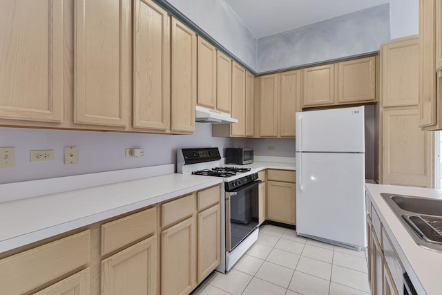 1985 Blackberry Ln Unit 1985, Hoffman Estates, IL 60169 - kitchen with freestanding refrigerator, gas range, under cabinet range hood, and light brown cabinets