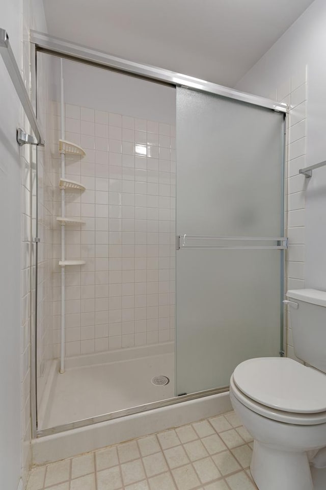 1985 Blackberry Ln Unit 1985, Hoffman Estates, IL 60169 - bathroom featuring toilet and a stall shower