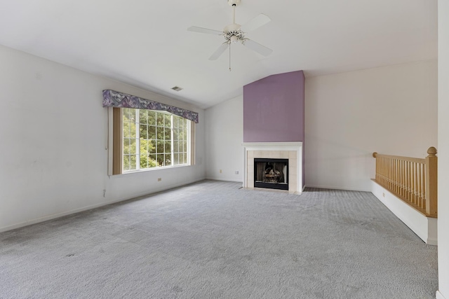 1985 Blackberry Ln Unit 1985, Hoffman Estates, IL 60169 - unfurnished living room featuring vaulted ceiling, carpet flooring, a ceiling fan, a fireplace, and baseboards