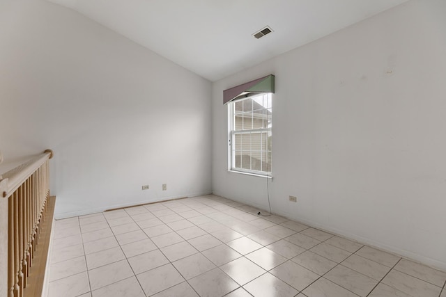 1985 Blackberry Ln Unit 1985, Hoffman Estates, IL 60169 - spare room featuring lofted ceiling and light tile patterned floors