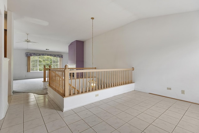 1985 Blackberry Ln Unit 1985, Hoffman Estates, IL 60169 - unfurnished room with lofted ceiling, ceiling fan, light tile patterned floors, and baseboards