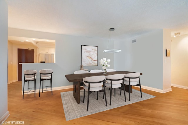 195 N Harbor Dr Unit 4305, Chicago, IL 60601 - dining space with baseboards and light wood-type flooring