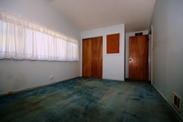 2876 S Scott St, Des Plaines, IL 60018 - unfurnished bedroom featuring carpet floors, vaulted ceiling, a closet, and baseboards