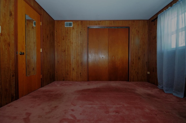 2876 S Scott St, Des Plaines, IL 60018 - bedroom featuring a closet, wooden walls, and carpet