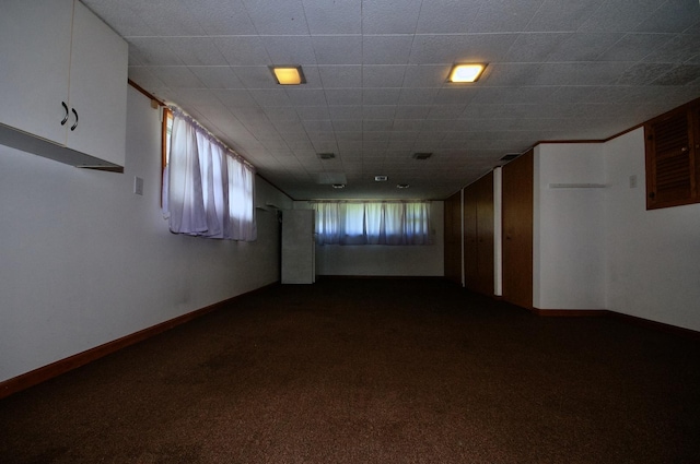 2876 S Scott St, Des Plaines, IL 60018 - empty room with dark colored carpet and baseboards