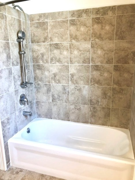 full bath with bathing tub / shower combination