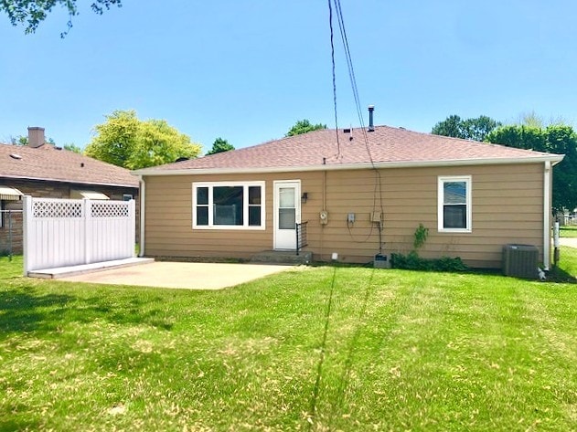 back of property featuring a patio area and central AC