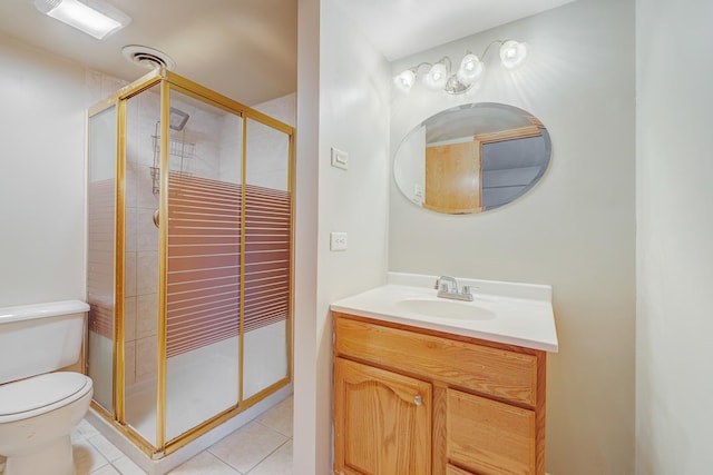 full bath with tile patterned floors, a stall shower, toilet, and vanity