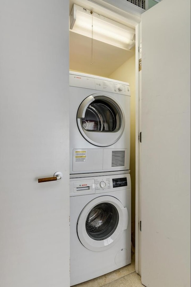 1212 N Lake Shore Dr Unit 12Cn, Chicago, IL 60610 - laundry area featuring estacked washer and dryer