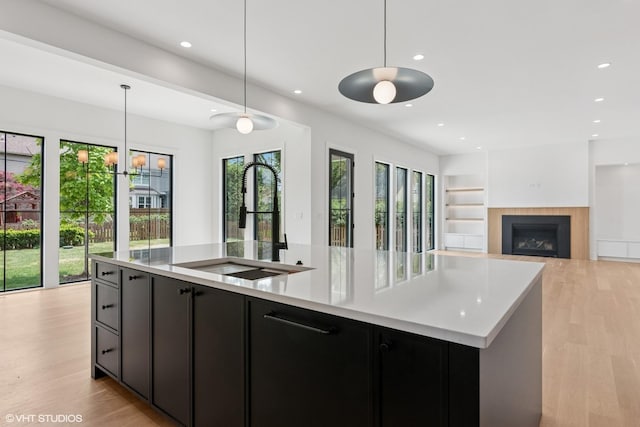 613 S Chatham Ave, Elmhurst, IL 60126 - kitchen with a sink, plenty of natural light, a center island with sink, open floor plan, and recessed lighting