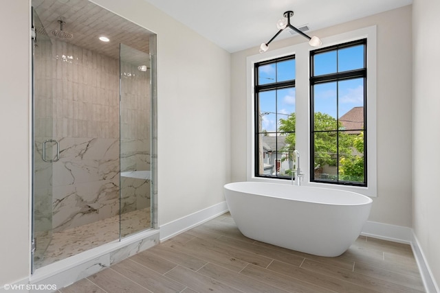 613 S Chatham Ave, Elmhurst, IL 60126 - bathroom with plenty of natural light, baseboards, and a marble finish shower