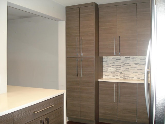bathroom featuring tasteful backsplash