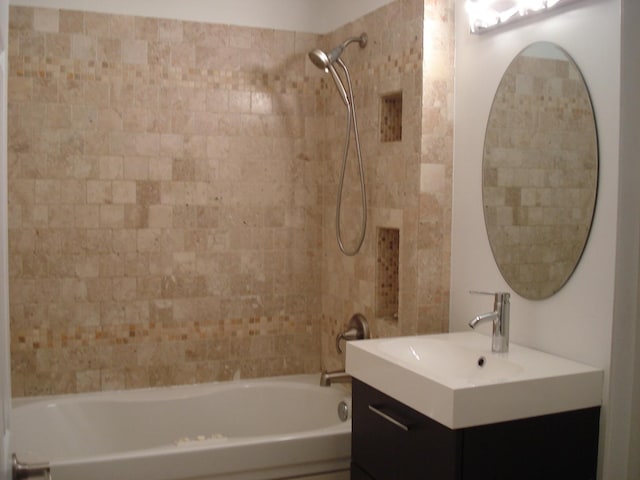bathroom with shower / washtub combination and vanity