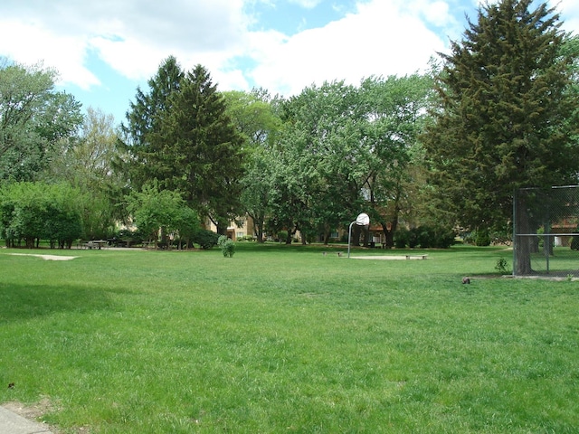 surrounding community with a lawn