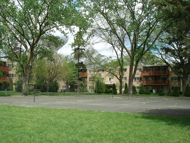 view of home's community with a lawn