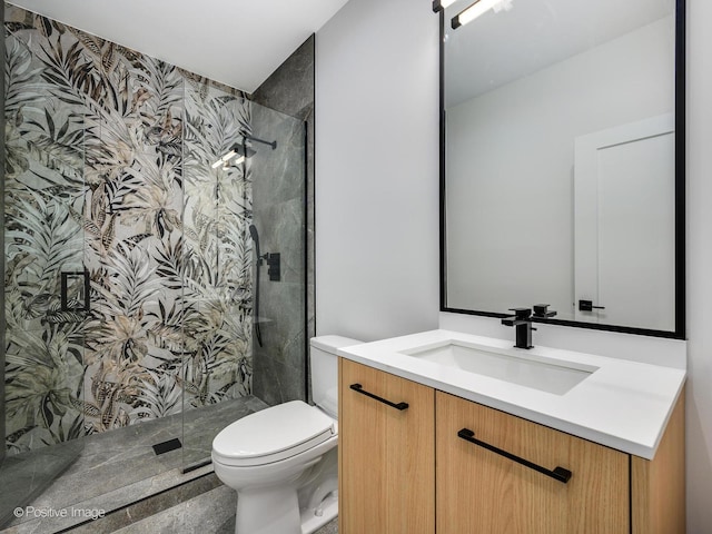 2535 W Belden Ave, Chicago, IL 60647 - bathroom with toilet, a shower stall, and vanity