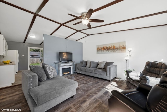 812 Sumac Dr, Streamwood, IL 60107 - living room with vaulted ceiling, a ceiling fan, dark wood-style floors, and a glass covered fireplace