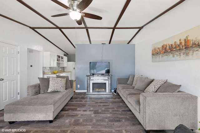 812 Sumac Dr, Streamwood, IL 60107 - living room with dark wood finished floors, lofted ceiling, a ceiling fan, and a glass covered fireplace
