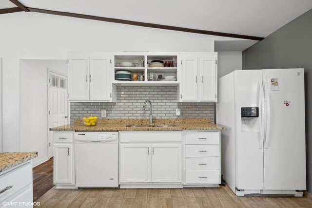 812 Sumac Dr, Streamwood, IL 60107 - kitchen featuring white appliances, a sink, vaulted ceiling, white cabinets, and light stone counters
