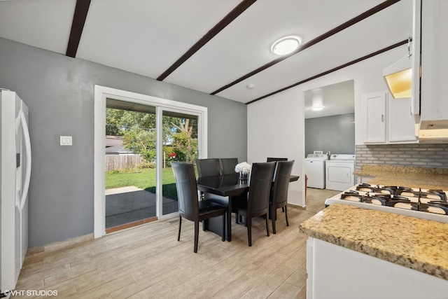 812 Sumac Dr, Streamwood, IL 60107 - dining area featuring washer and dryer and light wood-style floors