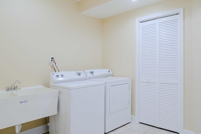 8834 Doubletree Dr N, Crown Point, IN 46307 - washroom with separate washer and dryer, baseboards, and light tile patterned floors