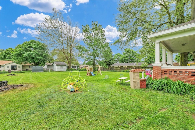 512 S Scarborough St, Sidney, IL 61877 - view of yard with a playground